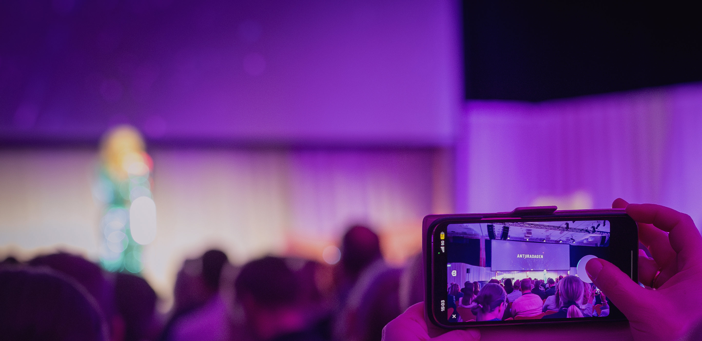 Man envisioning something through the Antura logo shape